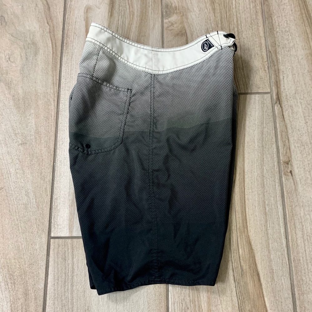 Volcom swim trunks in black/white pattern & logos